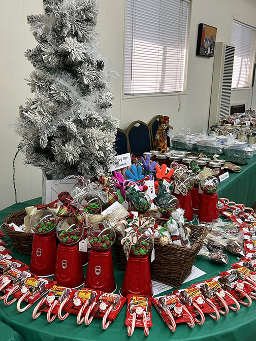 P.E.O. Holding Holiday Boutique