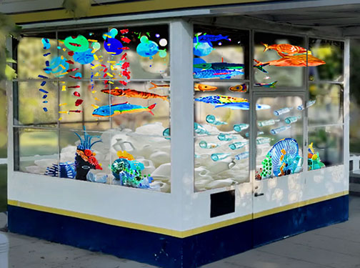 Underwater Bottleneck Art Installation at Adams Square Mini Park Gas Station